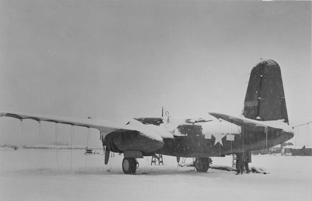 A Douglas A-20 Havoc is covered in snow after a snowstorm at Ladd Field, 15 February 1944. (National Archives) 