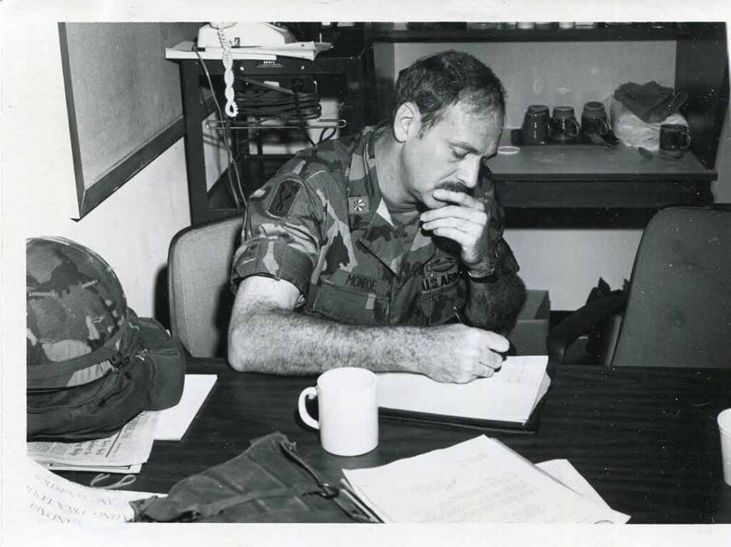 Major Carl Monroe prepares a psychological warfare message at the National Defense University’s war game GLOBEX ’83.