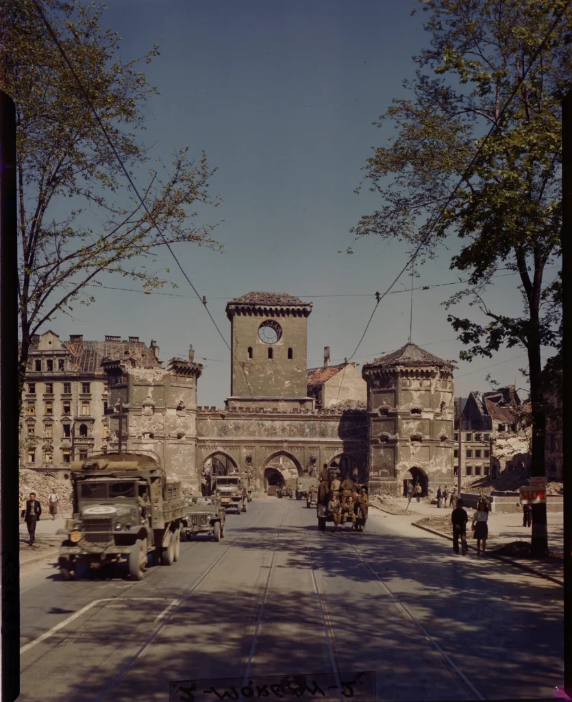 U.S. Army supply vehicles and personnel on the streets of Munich, circa 1947. (National Archives) 