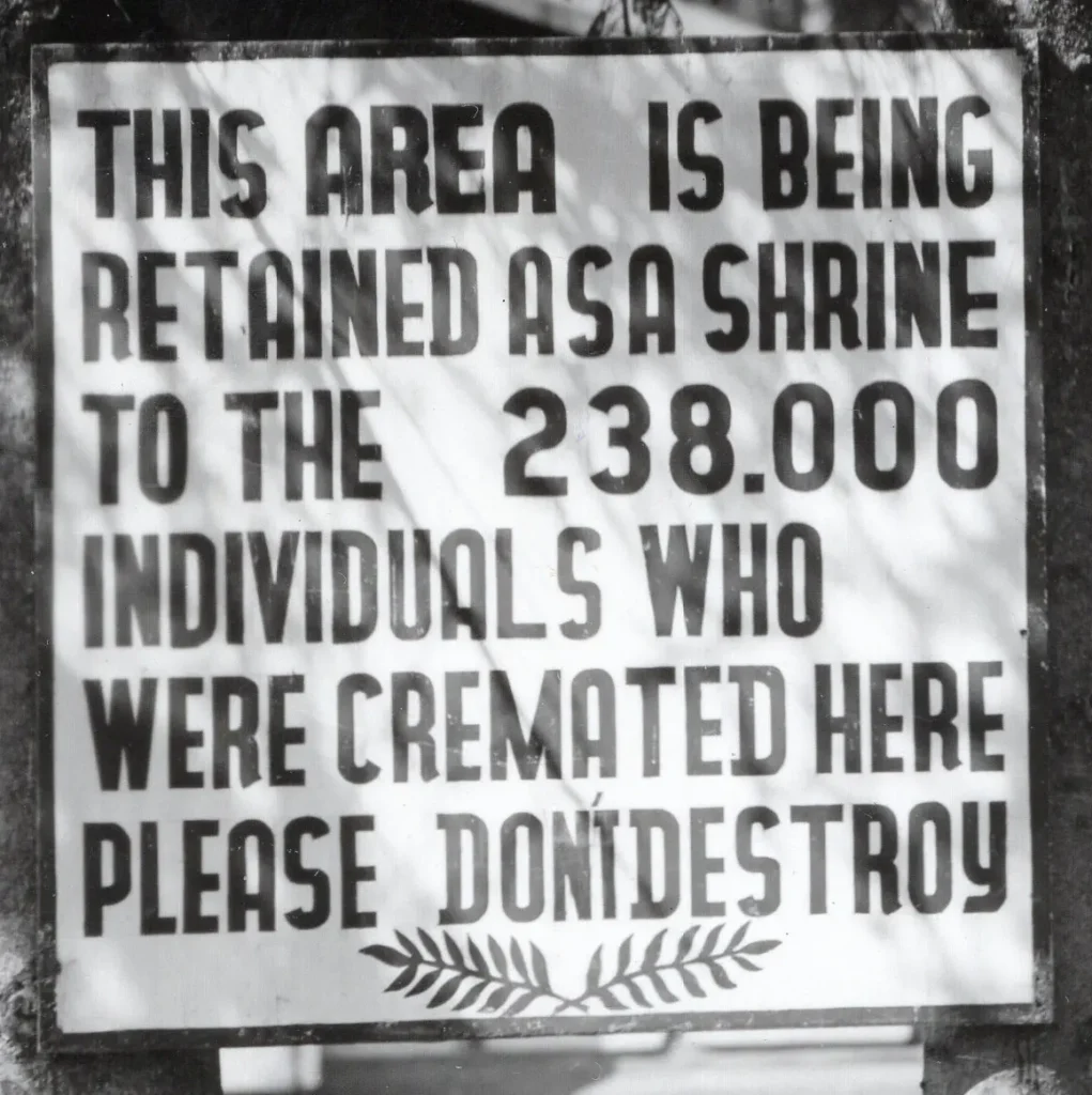 A sign erected outside of Dachau concentration camp’s crematorium is shown here in a 1948 photograph. Today, the crematorium area is the primary location for remembrance of the Dachau Concentration Camp Memorial Site. (National Archives)