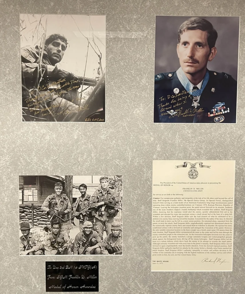 Photographs signed by CSM Franklin Miller, as well as his Medal of Honor citation for the 5 January 1970 action, are on display at the Miller Range at Fort Bragg. (Courtesy of Rob Graham) 